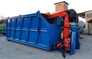 gru Marchesi montata su container con spazzole